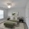 rendering of carpeted bedroom with window
