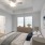 well lit bedroom with private bathroom
