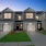 private garages at townhomes lit at night