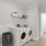 laundry room with side-by-side washer/dryer units